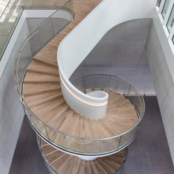 Staircase with elegant glass railings at the Bühler Innovation Campus in Uzwil | Stair railings | MetallArt Treppen
